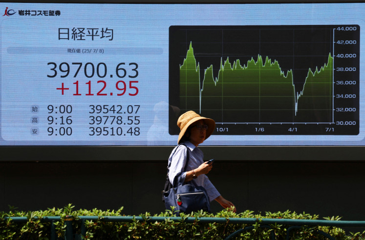 Asian Markets Pause Ahead of Fed Cut