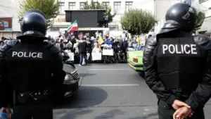 Iran Protests Enter Day 12, Officer Killed