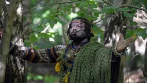 Officers were photographed leading the "tribe" from their camp last October